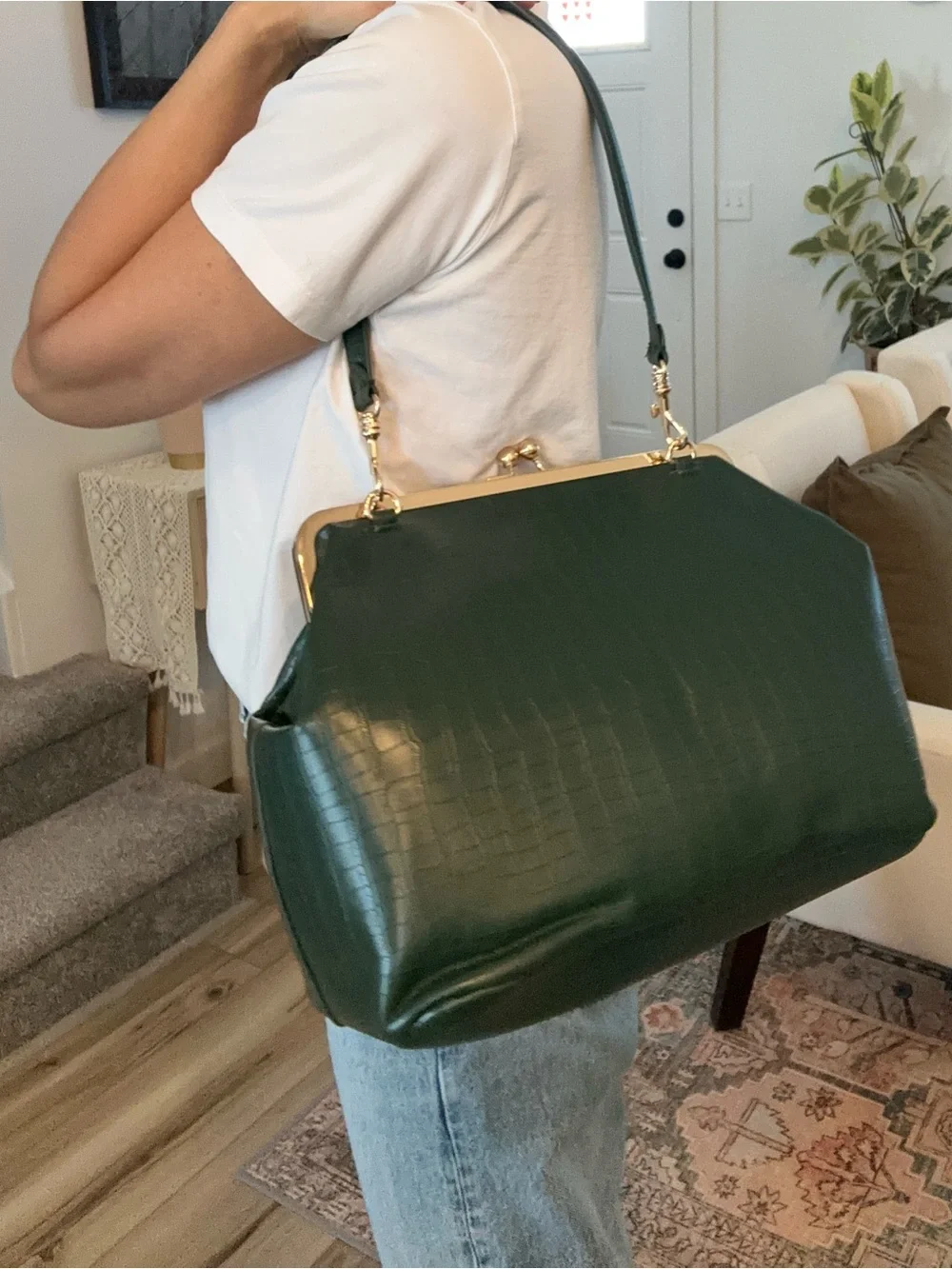 Structured Dark Green Croc-Embossed Frame Handbag with Gold kiss lock.